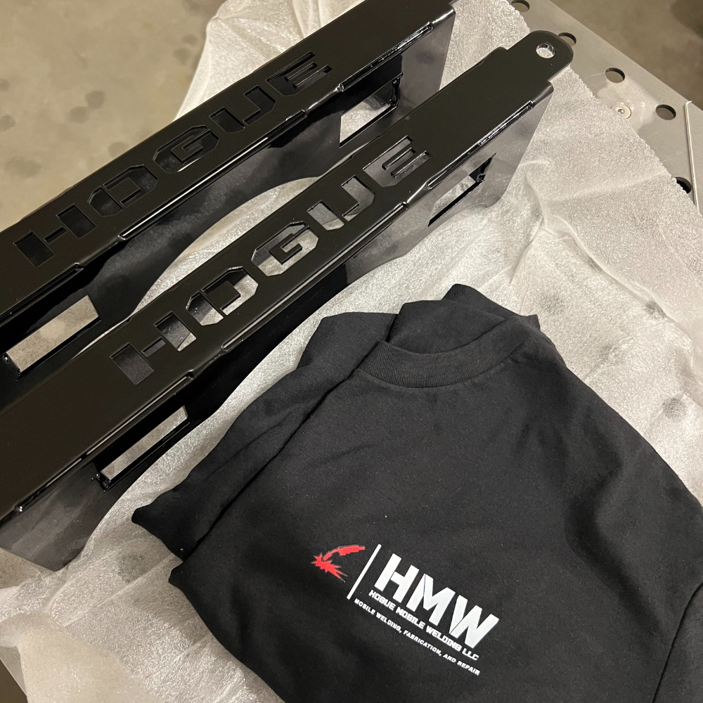 Powder-coated HOGUE laser-cut parts and branded shirt included in DIY welding cart kit